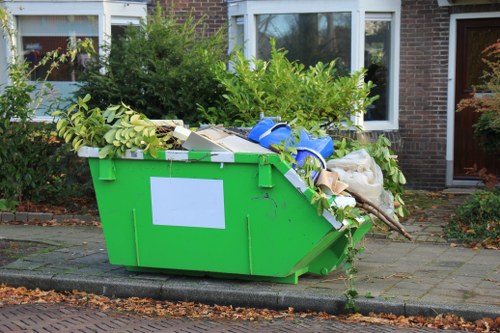 Variety of builders waste materials ready for removal